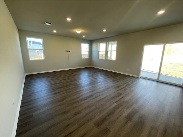 empty room featuring dark hardwood / wood-style floors