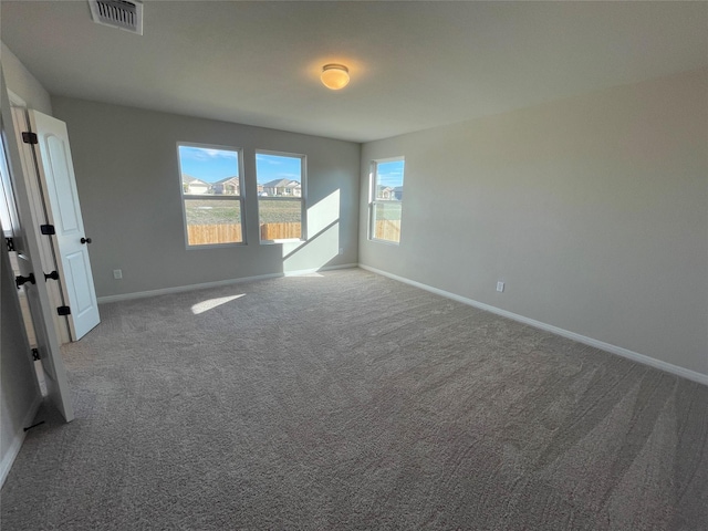 view of carpeted spare room