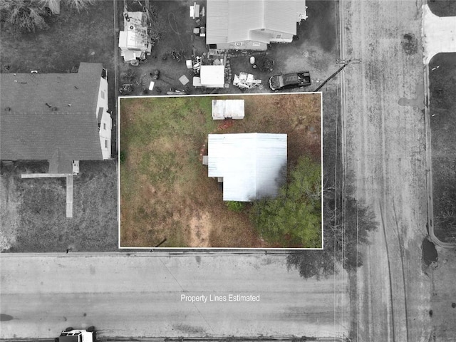 207 S Waco St, Giddings, TX 78942 - aerial view of property and surrounding area with property boundaries highlighted