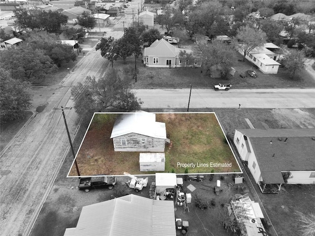 207 S Waco St, Giddings, TX 78942 - aerial view of property's location with property parcel outlined