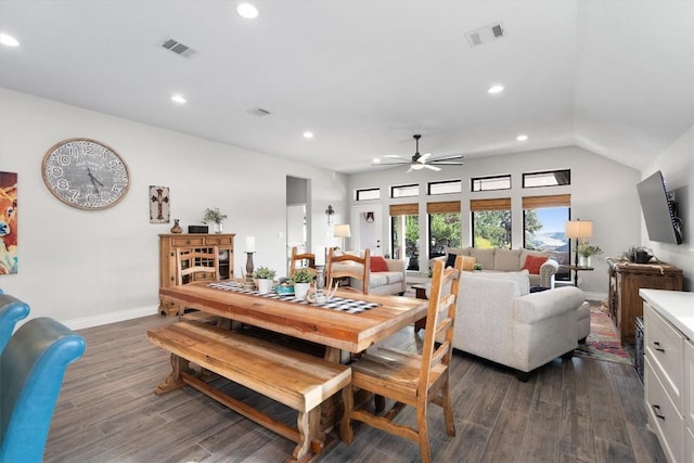 dining space featuring ceiling fan and dark wood-type flooring