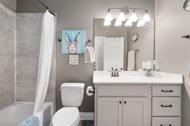 full bathroom with shower / bath combo with shower curtain, vanity, and toilet