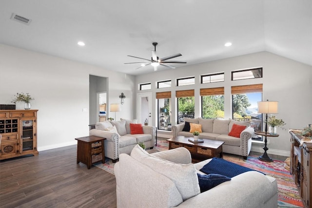 living room featuring ceiling fan, dark hardwood / wood-style flooring, and lofted ceiling