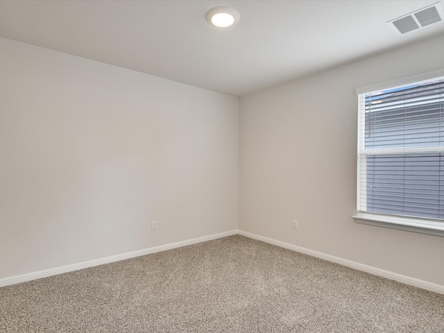 view of carpeted spare room