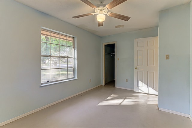 unfurnished room featuring ceiling fan