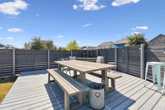 8712 Mina Dr, Austin, TX 78747 - wooden terrace featuring outdoor dining area