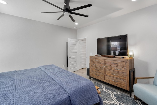 bedroom featuring ceiling fan and light wood-type flooring