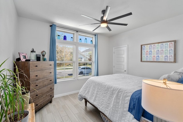 bedroom featuring ceiling fan and light wood-type flooring