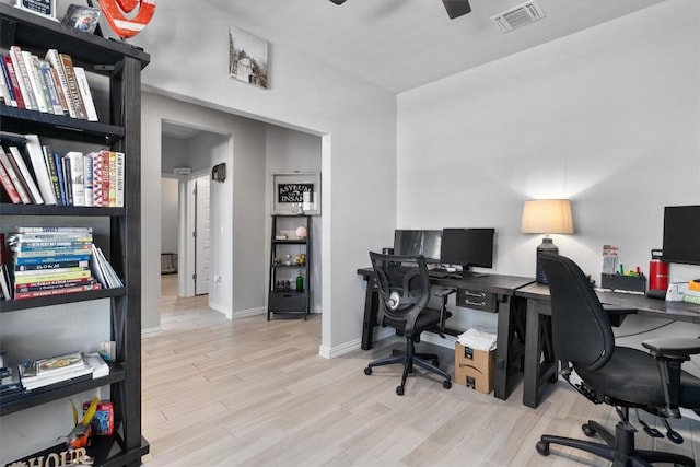 8712 Mina Dr, Austin, TX 78747 - office space with wood finished floors, ceiling fan, and baseboards