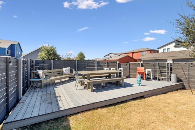 8712 Mina Dr, Austin, TX 78747 - wooden deck with a fenced backyard and outdoor dining area