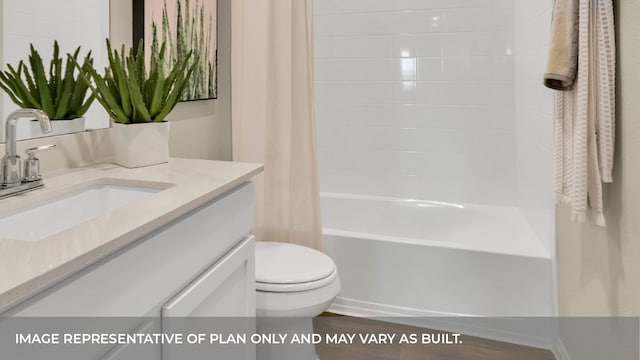 full bathroom with toilet, vanity, hardwood / wood-style flooring, and shower / bath combo with shower curtain