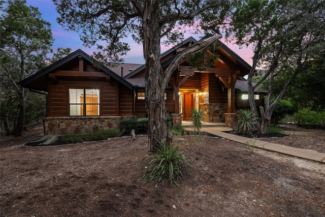 view of log cabin