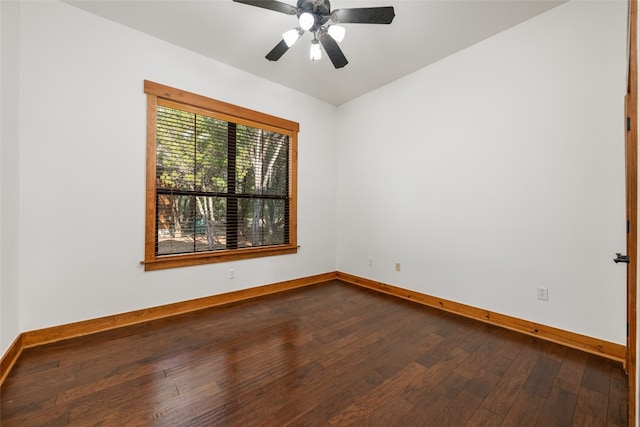 spare room featuring wood-type flooring and ceiling fan