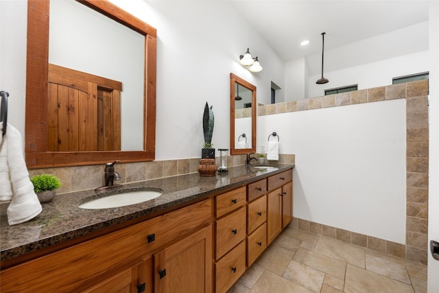 bathroom with walk in shower and vanity