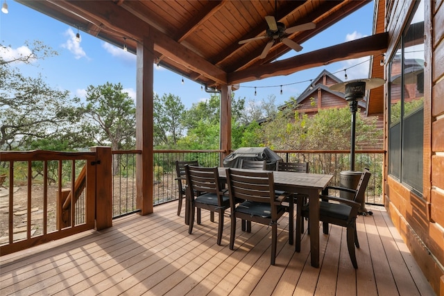 deck featuring grilling area and ceiling fan