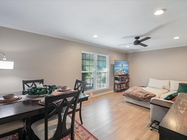 living room with ceiling fan, light hardwood / wood-style flooring, and ornamental molding