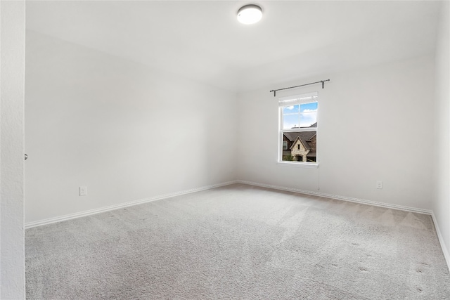 empty room featuring carpet floors