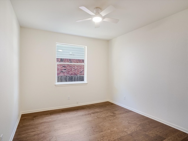 unfurnished room featuring ceiling fan and hardwood / wood-style flooring