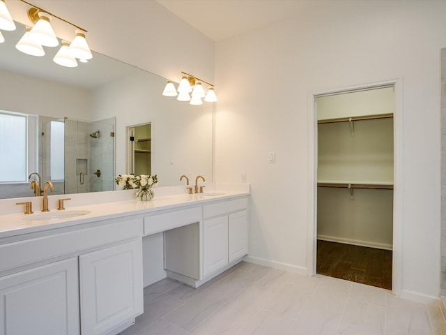 bathroom featuring vanity and walk in shower