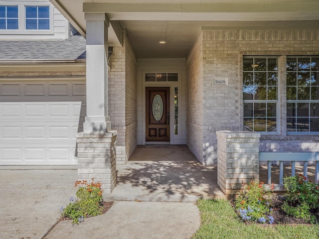 entrance to property featuring a garage