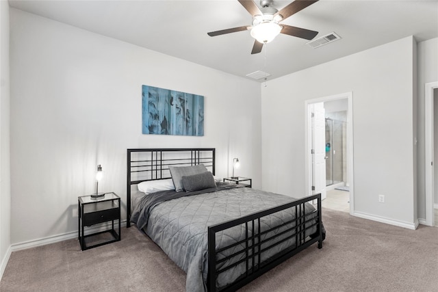 carpeted bedroom with ceiling fan and connected bathroom