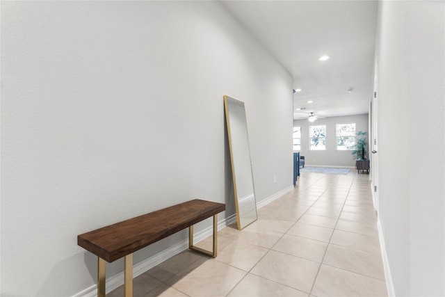 corridor featuring light tile patterned floors