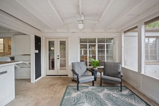 sunroom with french doors, beamed ceiling, and ceiling fan