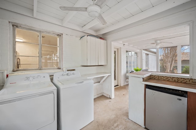 laundry room featuring washing machine and clothes dryer, wooden ceiling, and ceiling fan