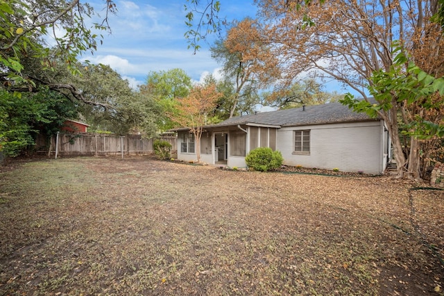 exterior space featuring a sunroom