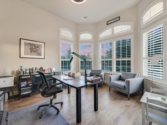 office area with hardwood / wood-style flooring