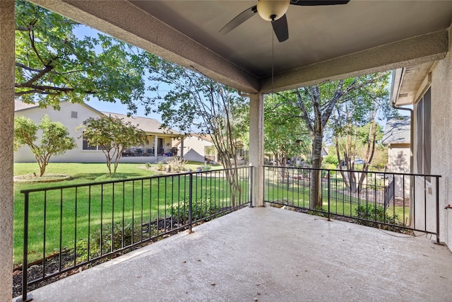 view of patio featuring ceiling fan