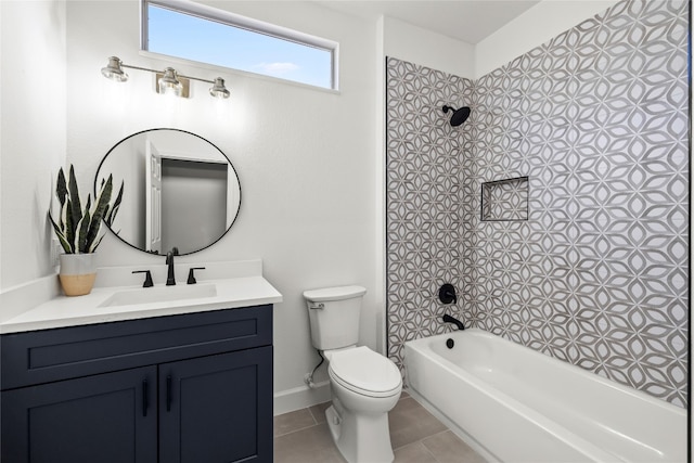 full bathroom with vanity, tile patterned flooring, toilet, and tiled shower / bath combo