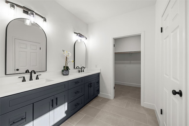 bathroom with vanity and tile patterned floors