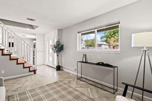 entryway featuring light parquet flooring