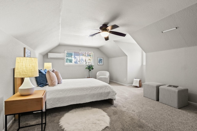 bedroom featuring carpet flooring, a textured ceiling, a wall unit AC, ceiling fan, and lofted ceiling