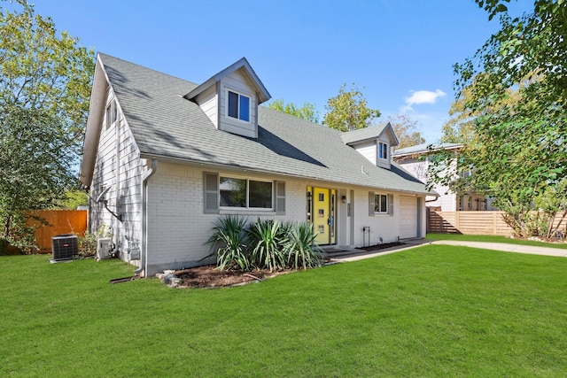 cape cod home with a front yard and central air condition unit