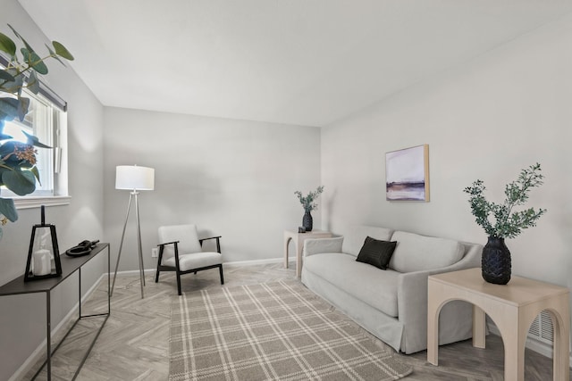 living room with light hardwood / wood-style flooring