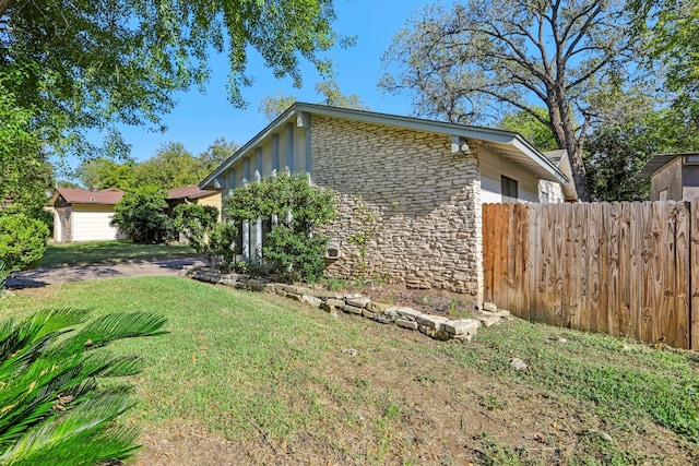 view of home's exterior featuring a lawn