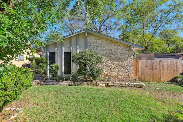 exterior space with a yard