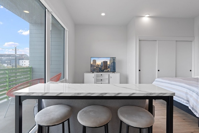 interior space featuring recessed lighting and light wood-style floors