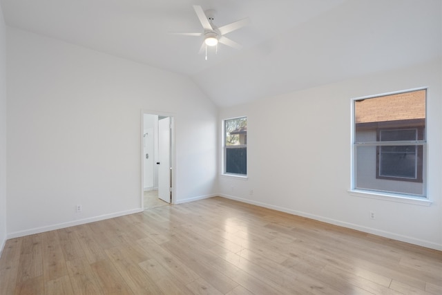 unfurnished room with light hardwood / wood-style floors, ceiling fan, and lofted ceiling