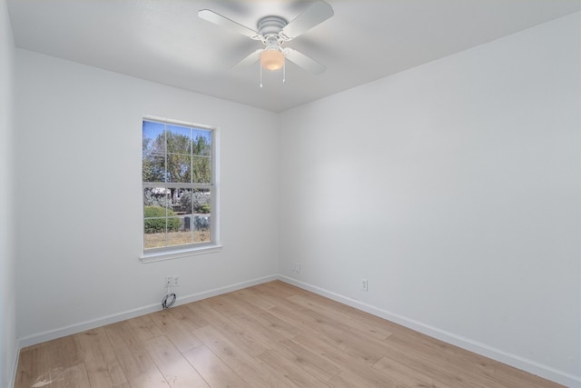 unfurnished room featuring ceiling fan and light hardwood / wood-style floors