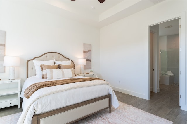 bedroom featuring hardwood / wood-style floors and ceiling fan