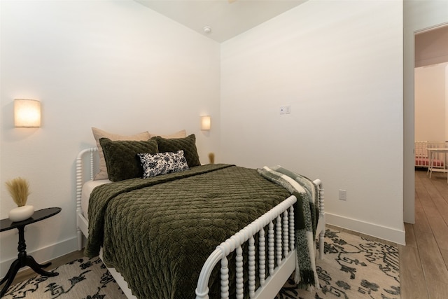 bedroom with light hardwood / wood-style flooring