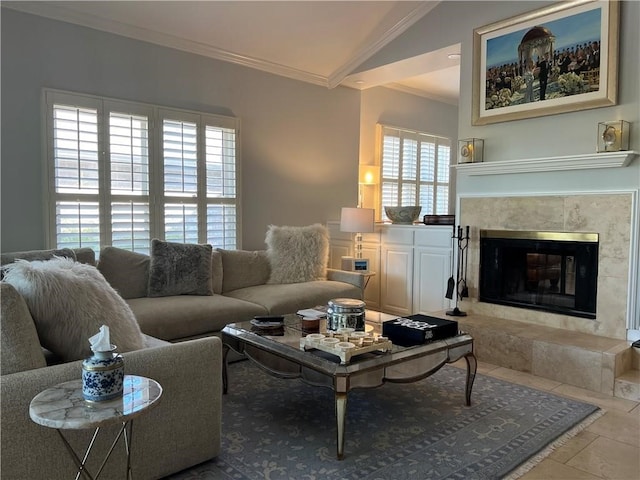 tiled living room featuring a fireplace, lofted ceiling, and crown molding