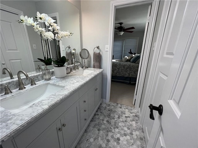 bathroom featuring vanity and ceiling fan