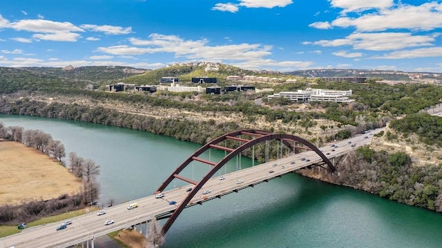 bird's eye view featuring a water and mountain view