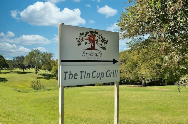 1201 Grove Blvd Unit 1501, Austin, TX 78741 - community / neighborhood sign featuring a lawn and view of golf course
