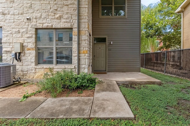 1201 Grove Blvd Unit 1501, Austin, TX 78741 - doorway to property with stone siding