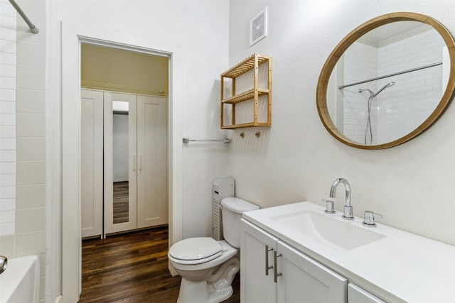 1201 Grove Blvd Unit 1501, Austin, TX 78741 - bathroom with vanity, wood finished floors, and  shower combination